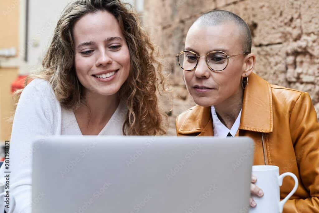 women browsing on a laptop